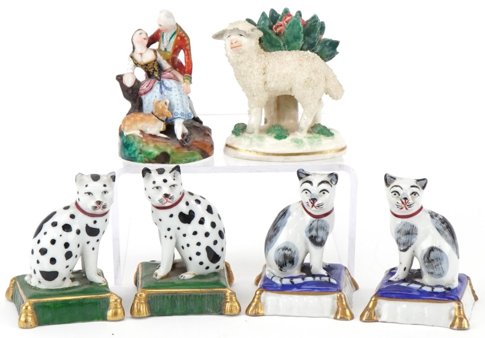 Chelsea and Staffordshire style porcelain figures and animals including two pairs of cats and a