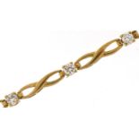 9ct gold clear stone infinity link bracelet, 18cm in length, 4.9g