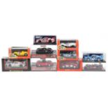 Ten 1:32 scale model slot cars with boxes and cases including MRRC International Hobbies Shelby