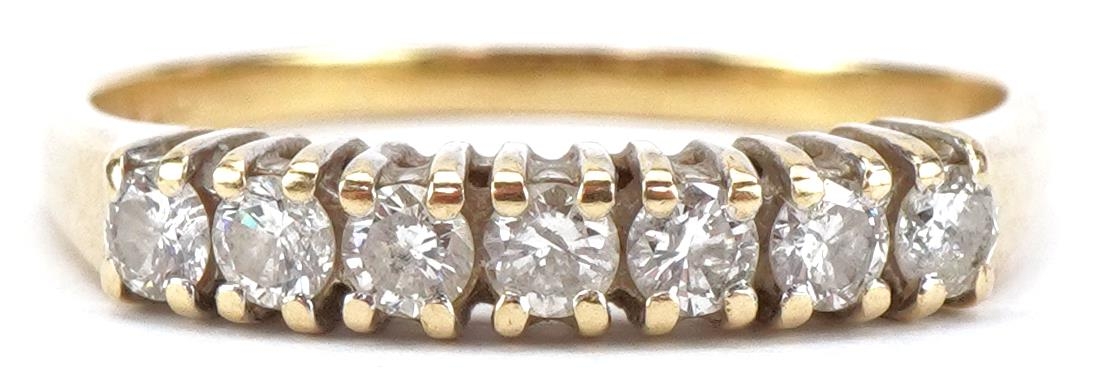 Unmarked gold diamond half eternity ring, total diamond weight approximately 0.50 carat, size S/T,