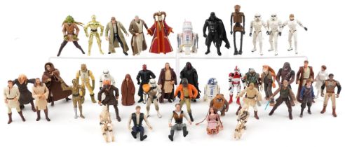 Vintage and later Star Wars action figures including R2D2, Darth Vader and C3PO