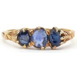 Antique unmarked gold blue spinel three stone ring with floral shoulders, tests as 15ct gold, size