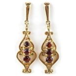 Pair of 9ct gold garnet drop earrings, each 2.5cm high, total 1.5g