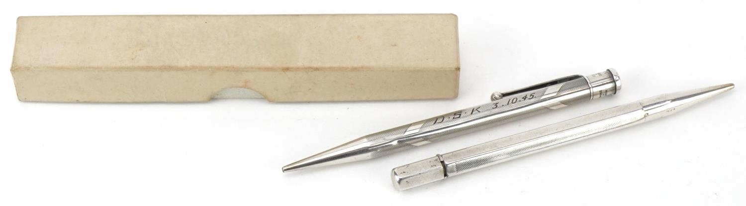 Two engine turned silver propelling pencils including Yard-O-Led, the largest 12cm in length,