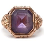 Victorian unmarked gold and yellow metal amethyst ring with ornate setting, the amethyst