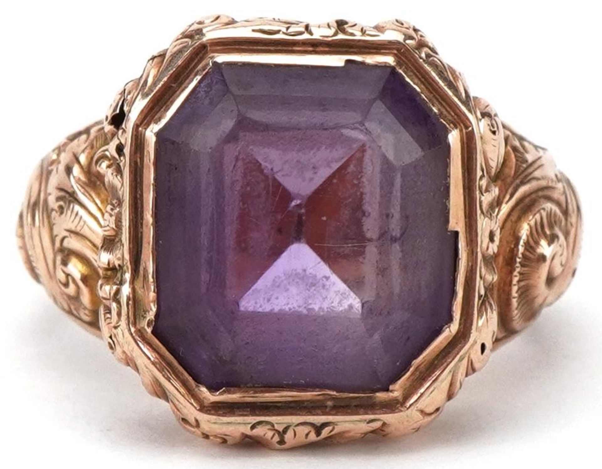 Victorian unmarked gold and yellow metal amethyst ring with ornate setting, the amethyst