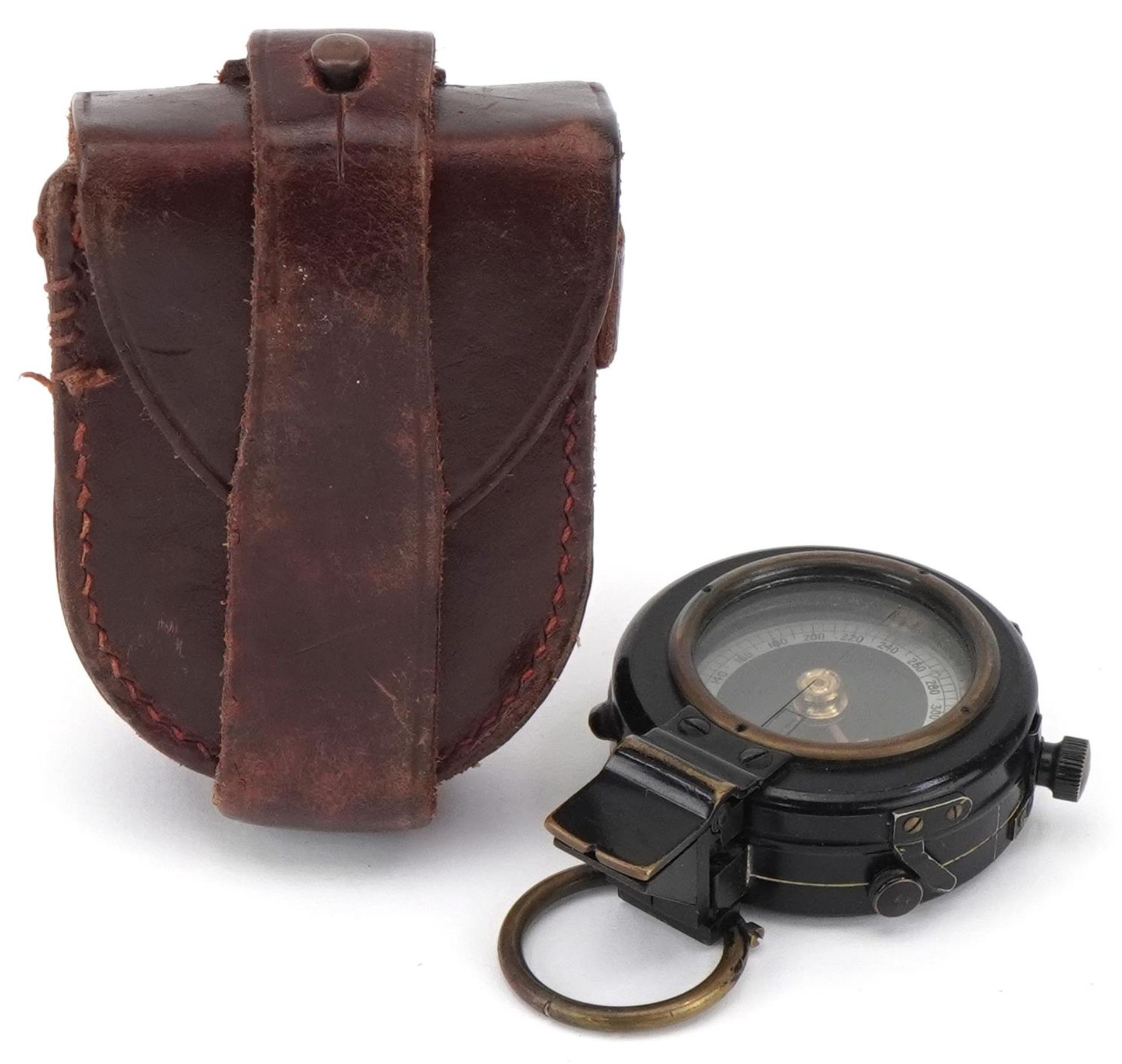 Military interest World War I compass housed in a leather case, Pat. Appd For, 5cm in diameter