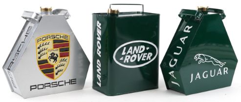 Three advertising metal fuel cans a Porsche, Jaguar and Land Rover, each 34cm high