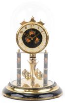 Brass anniversary clock under a glass dome with rose design dial, 32cm high