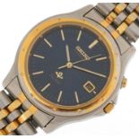 Seiko, gentlemen's Seiko SQ100 kinetic wristwatch having blue dial with date aperture, model 5M22-