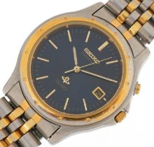 Seiko, gentlemen's Seiko SQ100 kinetic wristwatch having blue dial with date aperture, model 5M22-