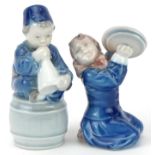 Pair of Copenhagen seated child musicians , each 11cm high