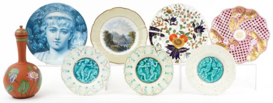 Group of Victorian European and English plates including Prattware, majolica cupids at play, hand