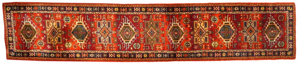 Rectangular Turkish carpet runner having and all over floral design 385cm x 69cm