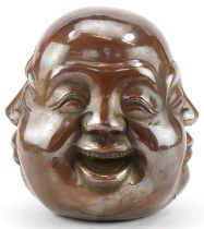 Chinese patinated bronze four face paperweight, 12cm high