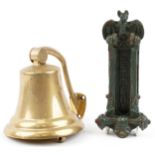 Shipping interest brass ship's bell and a green painted cast iron bat design doorknocker letter