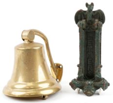 Shipping interest brass ship's bell and a green painted cast iron bat design doorknocker letter