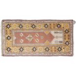 Large Middle Eastern brown and cream ground prayer rug with geometric borders, 225cm x 112cm