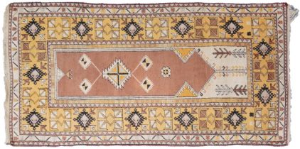 Large Middle Eastern brown and cream ground prayer rug with geometric borders, 225cm x 112cm