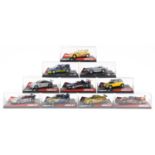 Ten Ninco 1:32 scale model slot cars with cases including Citroen Saxo, LTDTTABT and Mini