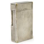 S T Dupont, French silver plated pocket lighter, serial number 8111DK, 5.5cm high