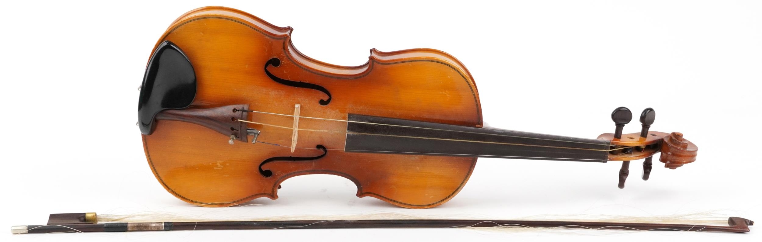 Blessing wooden violin with one piece back and rosewood bow housed in a protective case, the
