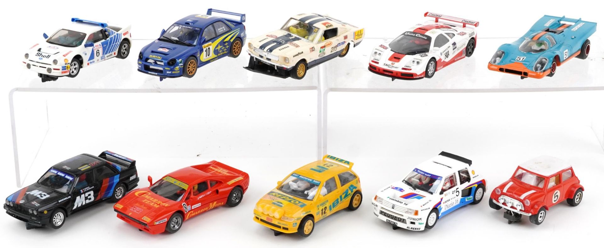 Ten vintage and later slot cars including Scalextric, Hornby and Ninco