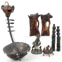 Tribal artefacts including a Far Eastern kumkum box, Ashanti cast bronzed study of a chief, pair