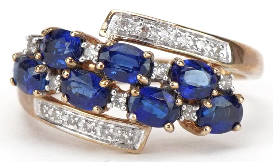 9ct gold blue spinel and diamond crossover cluster ring, size P, 2.8g