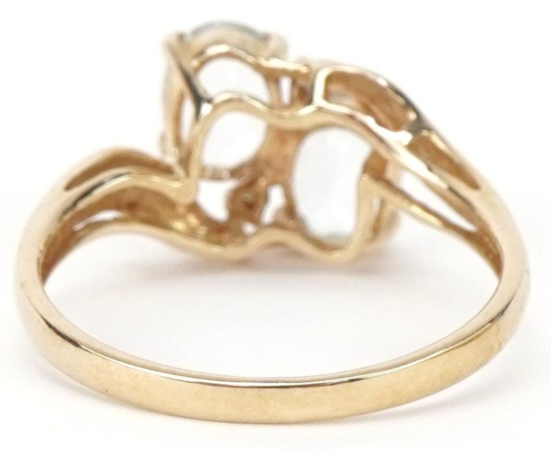 9ct gold aquamarine and diamond four stone crossover ring, size P, 2.4g - Bild 2 aus 4