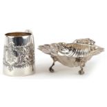 Silver items comprising Victorian floral embossed christening tankard and a floral engraved shell