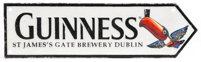 Guinness painted cast iron advertising plaque, 38cm x 11cm