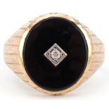 9ct gold black onyx signet ring set with a clear stone, size R, 5.0g