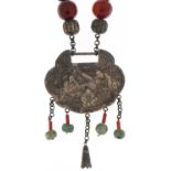 Large Chinese white metal, jade and amber coloured bead necklace embossed with figures seated at a