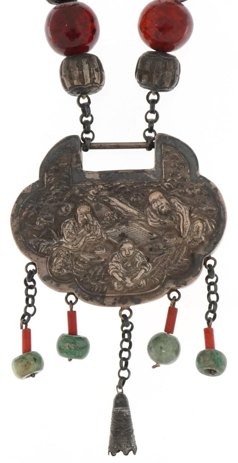 Large Chinese white metal, jade and amber coloured bead necklace embossed with figures seated at a