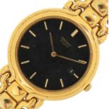 Seiko, gentlemen's gold plated Seiko 6030 quartz wristwatch having black dial with date aperture,