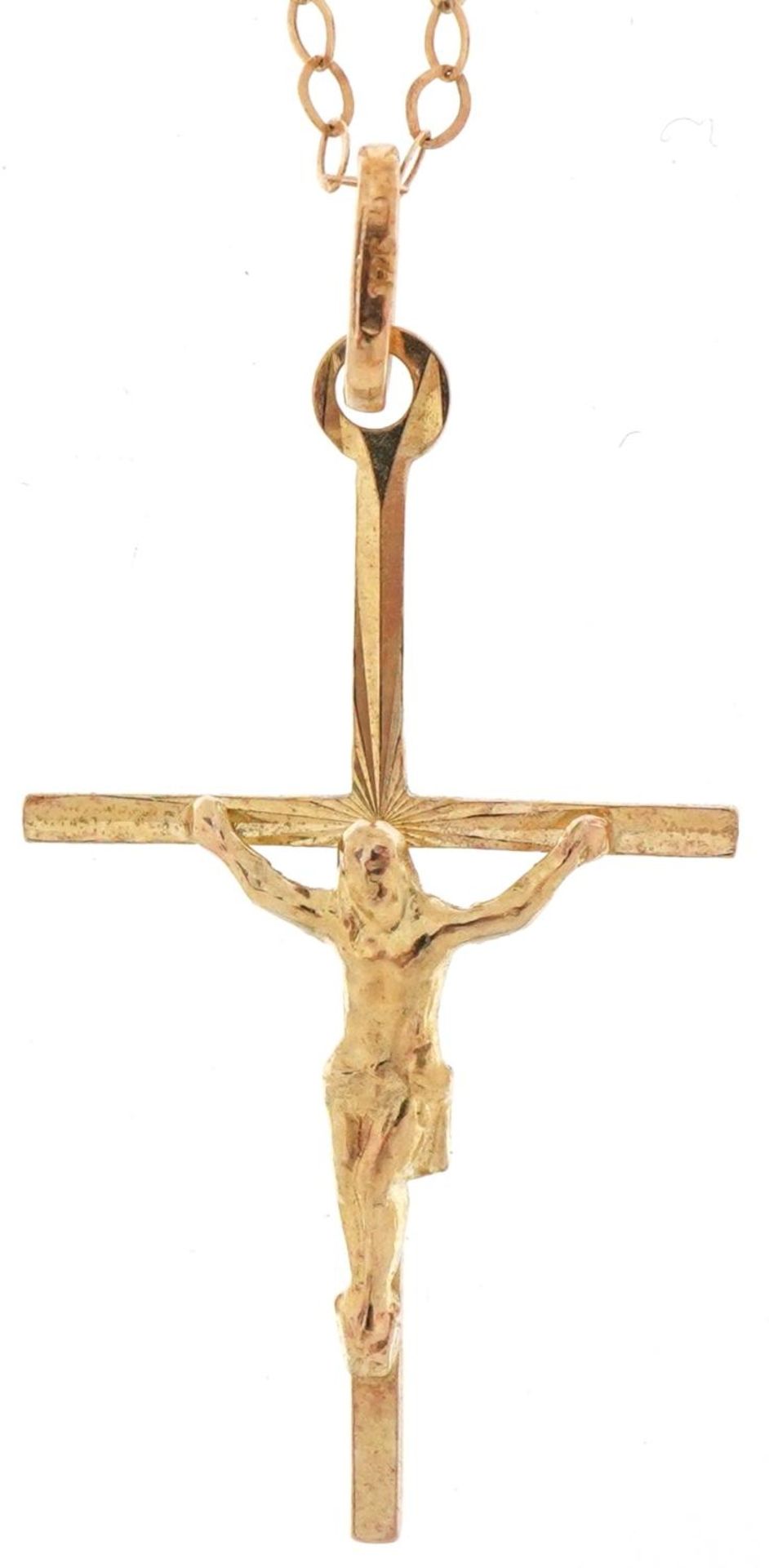 9ct gold crucifix pendant on a 9ct gold necklace, 3cm high and 40cm in length, total 1.0g