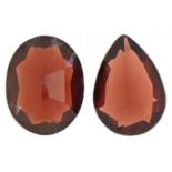 Two loose garnet gemstones, total weight approximately 4.41 carat