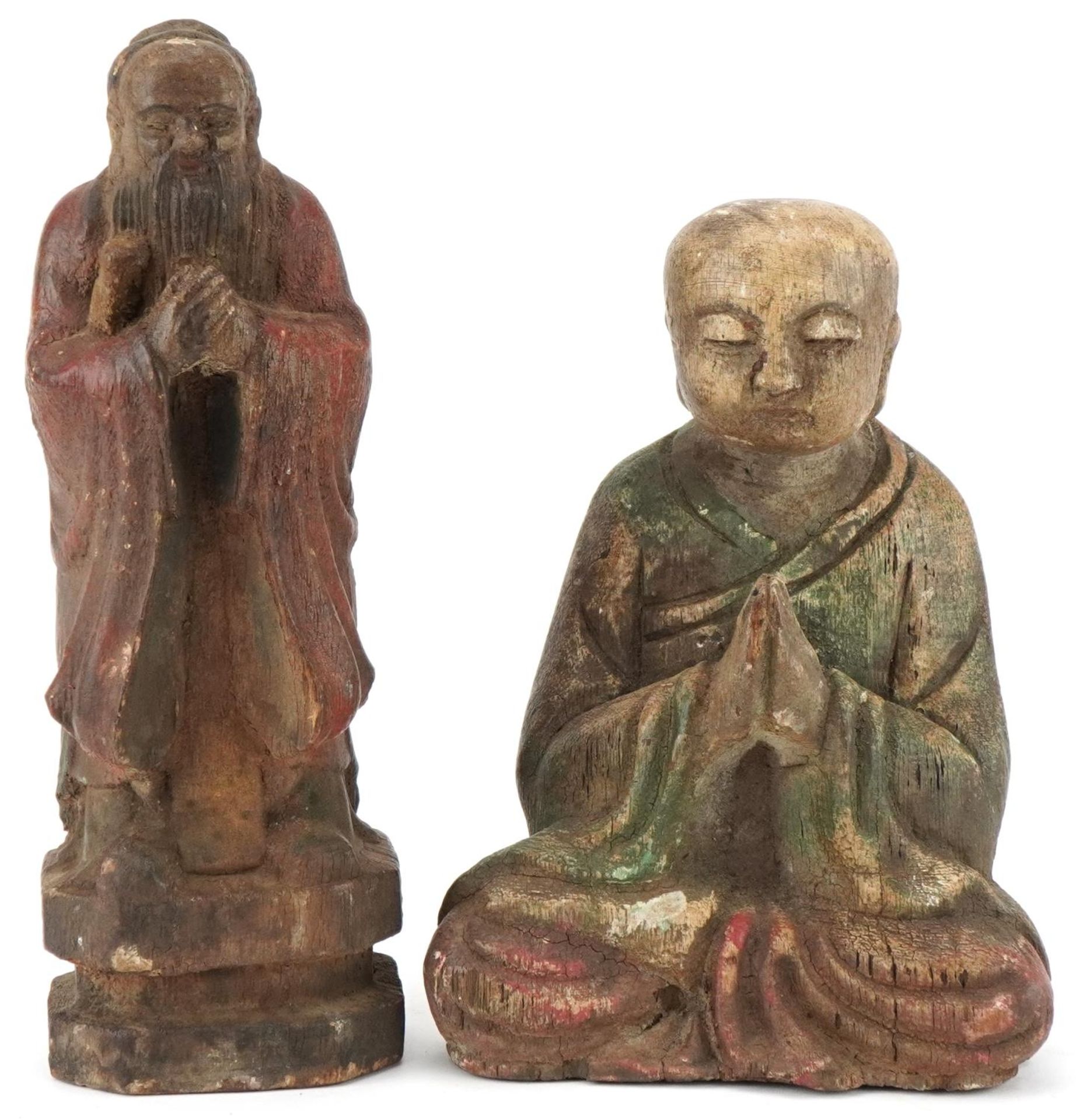 Chinese polychrome painted carved wood seated Buddha and an Elder figure, the largest 27cm high