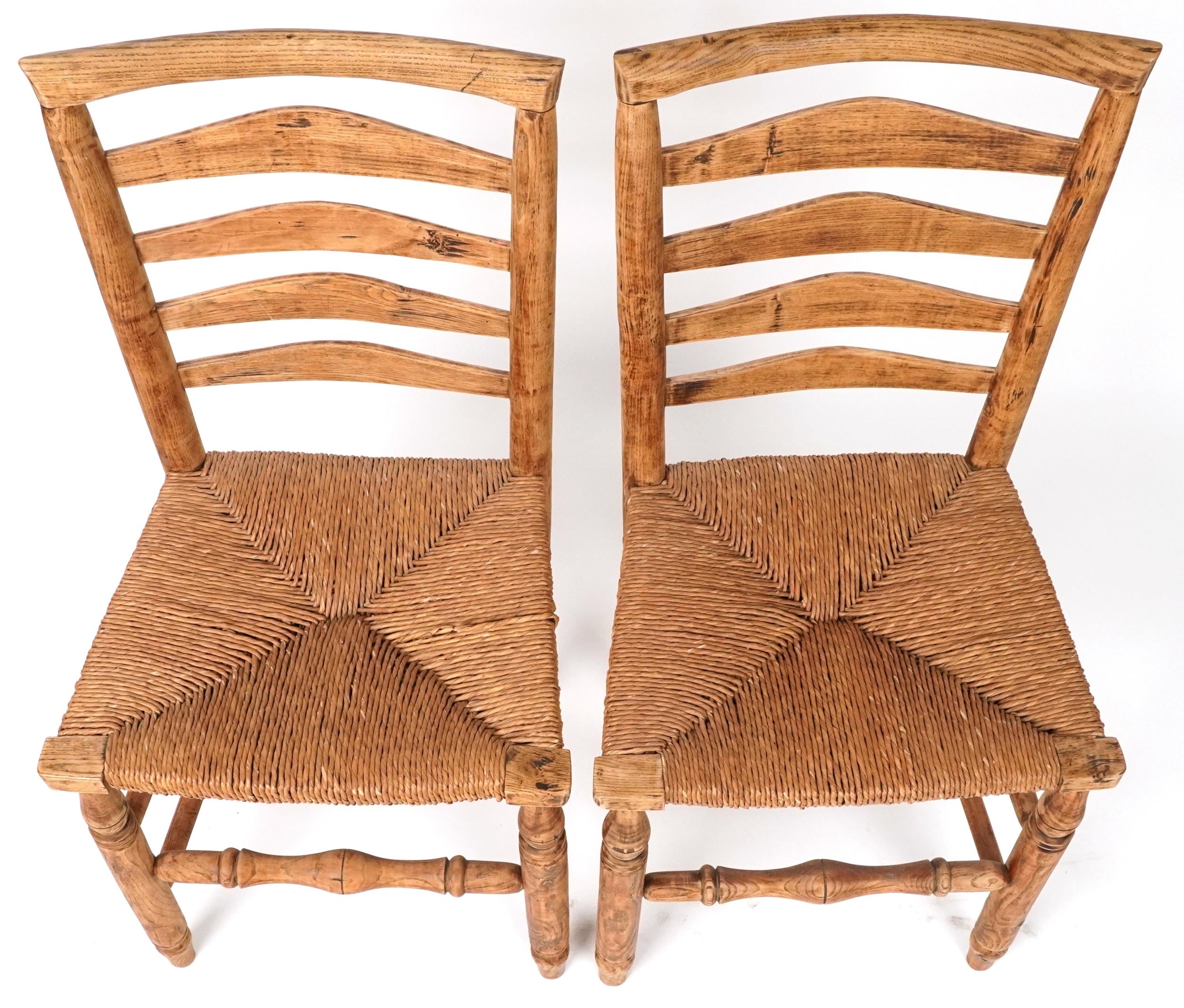 Pair of beech ladderback chairs with cane seats, each 93cm high - Image 3 of 4