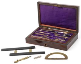 Victorian brass drawing set housed in a silk and velvet lined fitted rosewood case, 21cm wide