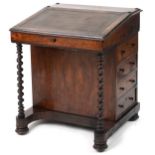 Rosewood and mahogany Davenport with lift up slope and four side drawers opposing four dummy