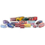 Large collection of novelty biscuit and chocolate tins in the form of motor vehicles, the largest
