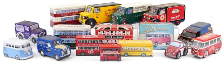 Large collection of novelty biscuit and chocolate tins in the form of motor vehicles, the largest