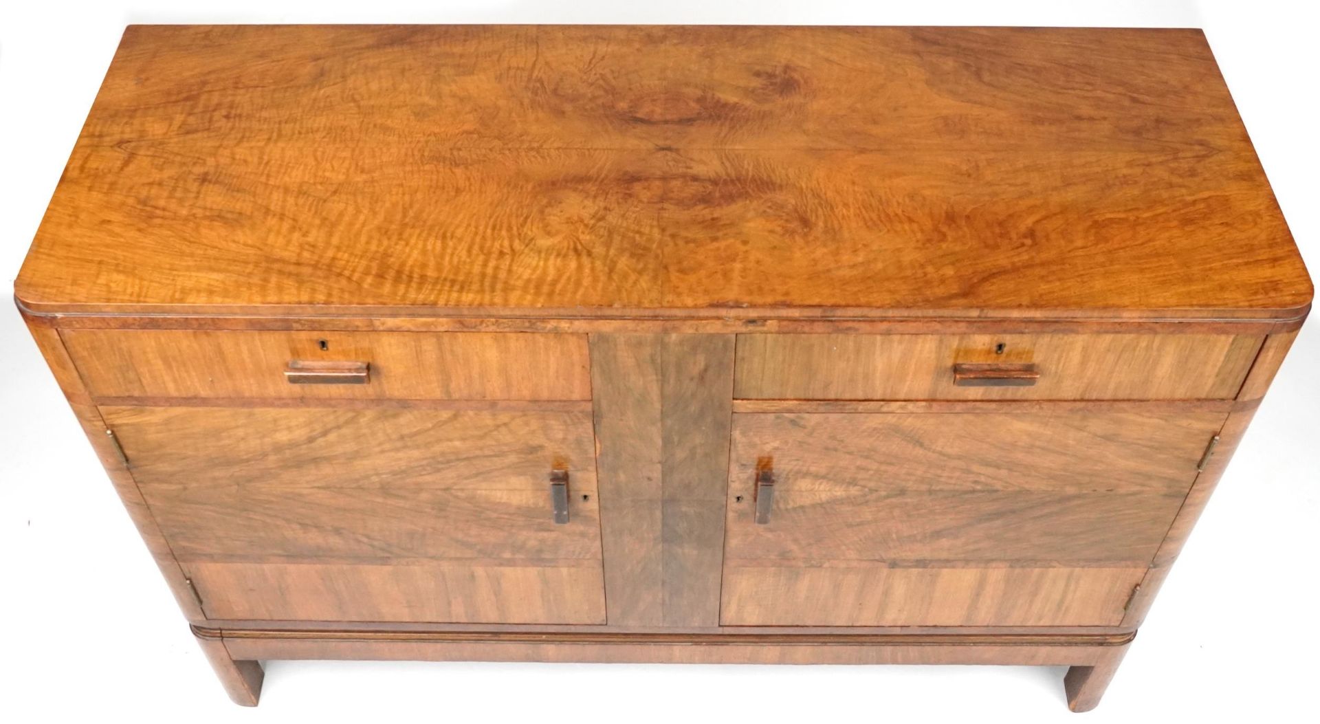 Art Deco walnut sideboard with two drawers above a pair of cupboard doors enclosing shelves, 95cm - Image 2 of 4