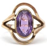 Modernist 9ct gold amethyst openwork ring, the amethyst approximately 10.50mm x 6.80mm x 5.0mm deep,