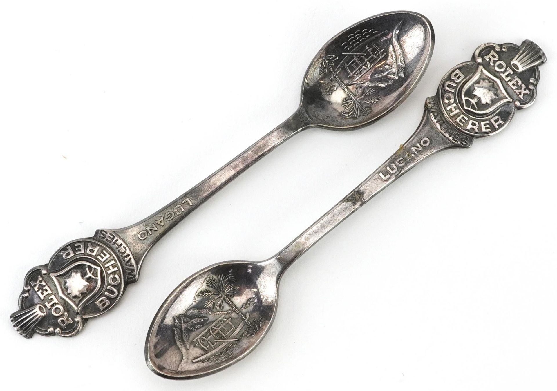 Two Rolex Bucherer silver plated advertising teaspoons, each 10.5cm in length