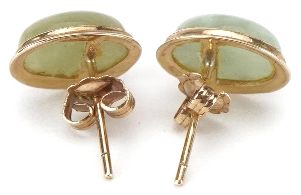 Pair of 9ct gold cabochon green jade stud earrings, each 10mm high, total 1.5g - Image 2 of 2
