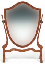 Mahogany shield shaped swing mirror, 58cm high