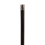 Hardwood walking stick with floral engraved white metal pommel and brass ferule, 87cm in length